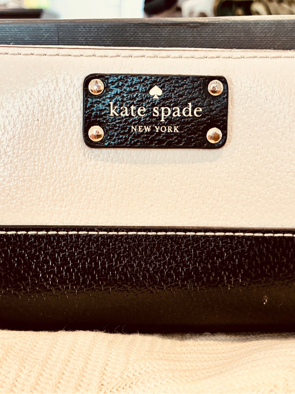 kate spade Black and Tan Leather Wallet with Gold Hardware